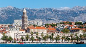 Split, Croatia's coastline from the Adriatic Sea features the towering white Cathedral of Saint Dominus
