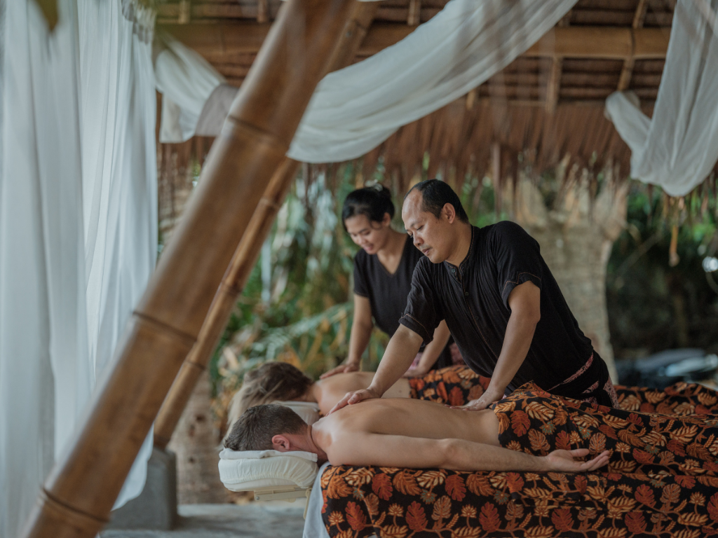 Couples massage therapy and wellness at Bawah Reserve luxury private island resort
